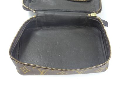LOUIS VUITTON. Lot composed of a toiletry...