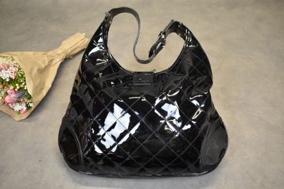 BURBERRY. Large black patent leather satchel...