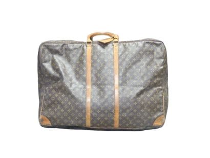 LOUIS VUITTON. Large soft suitcase in monogram...