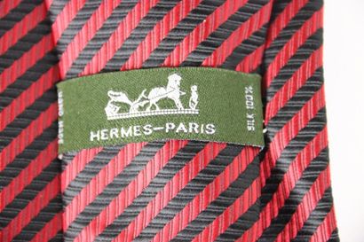 Meeting of two silk ties, one HERMES with...