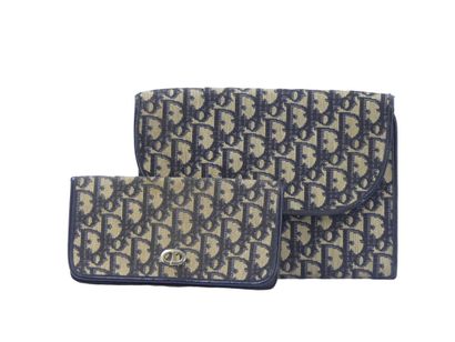 Christian DIOR. Navy leather and damask fabric...