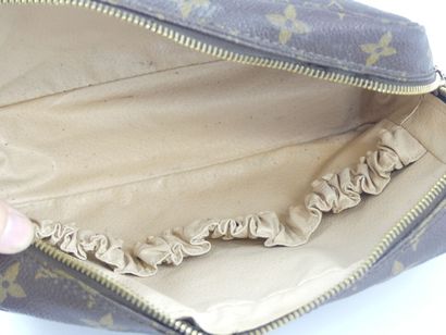 LOUIS VUITTON. Toilet bag in monogram canvas...