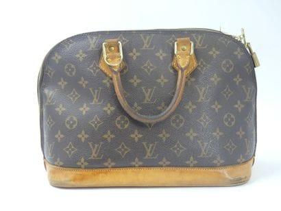 LOUIS VUITTON. Alma bag in monogram canvas...