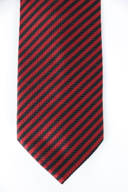 Meeting of two silk ties, one HERMES with...