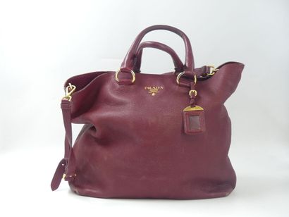 PRADA. Tote bag in dark red grained leather,...