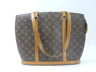 LOUIS VUITTON. Babylone bag in monogram canvas...