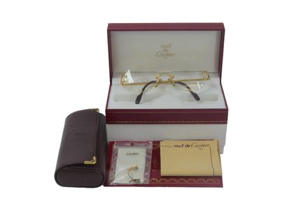 CARTIER, Must. Pair of eyeglasses with gold...