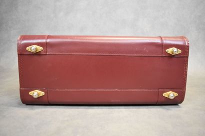 CARTIER. Must. Important briefcase in burgundy...