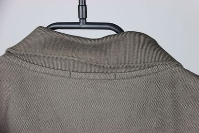 LACOSTE. Women's polo shirt in taupe color,...