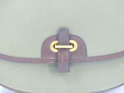 HERMES. Green canvas and leather golf ball...