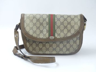 GUCCI. Shoulder bag in coated canvas and...