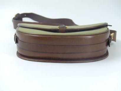 HERMES. Green canvas and leather golf ball...
