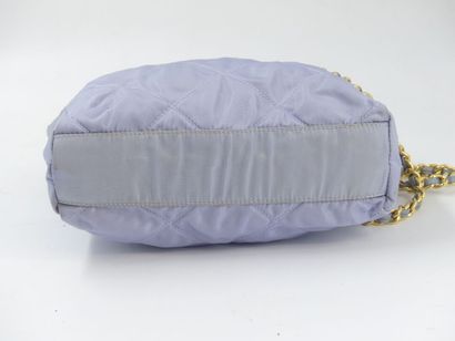 PRADA. Bag in lila quilted fabric, chain...