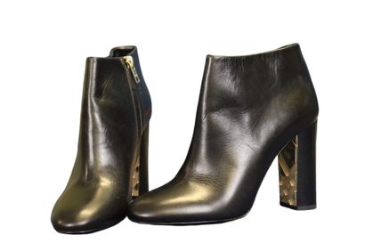 BURBERRY. Pair of black leather heeled boots,...