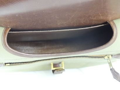 HERMES. Green canvas and leather golf ball...