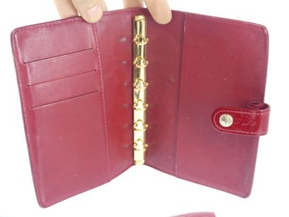 LOUIS VUITTON. Meeting of a diary holder...