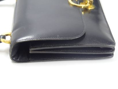 HERMES. Ring bag in black box calf, gold...