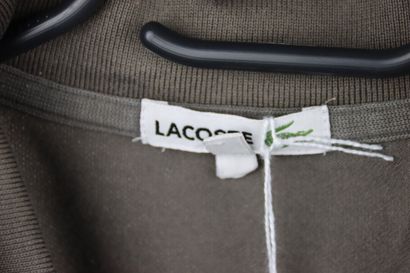LACOSTE. Women's polo shirt in taupe color,...
