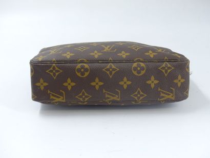 LOUIS VUITTON. Lot composed of a toiletry...