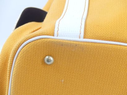 LANCEL. Orange canvas bucket bag with its...