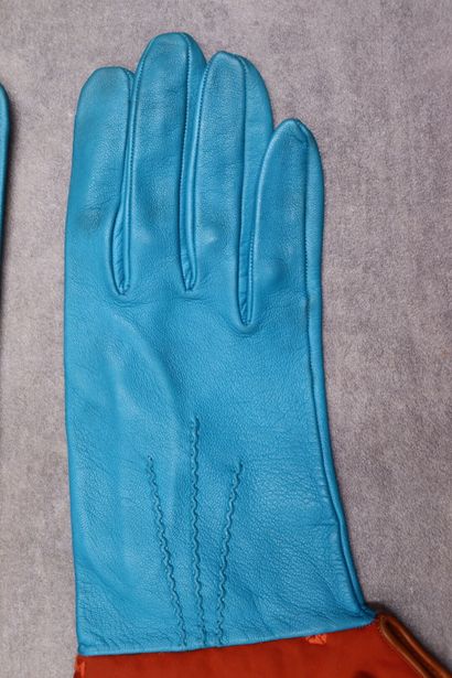 HERMES. Pair of turquoise leather gloves...