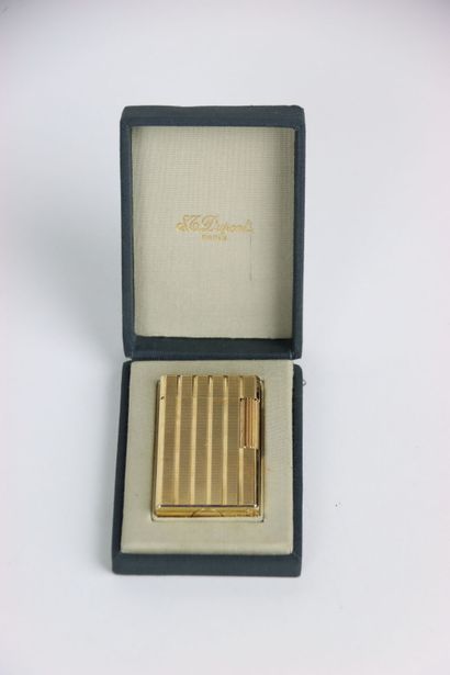 S.T. DUPONT BRIQUET in gilded metal with...