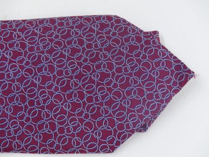 HERMES. Silk tie, cherry background with...