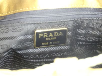 PRADA. Small minaudiere in olive green satin,...