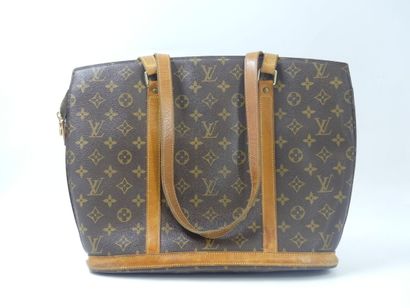 LOUIS VUITTON. Babylone bag in monogram canvas...