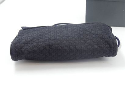 Christian DIOR. Clutch bag in navy blue fabric...