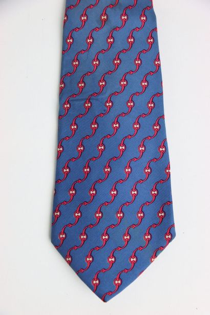 HERMES. Tie in its box, blue color with red...