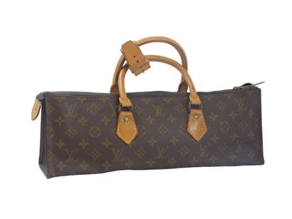 LOUIS VUITTON. Triangular bag in monogram...