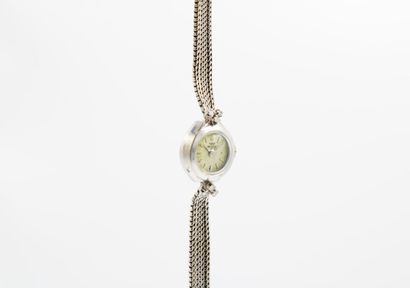 NOVLUX
Lady's watch in white gold and diamonds....