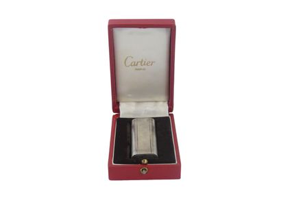 CARTIER. Lighter in silver plated metal,...