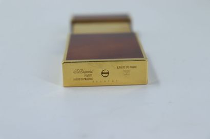 DUPONT. Pocket alarm clock in gilded metal...