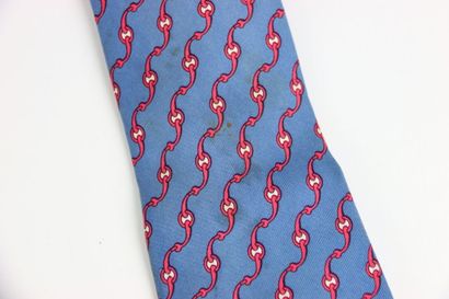 HERMES. Tie in its box, blue color with red...