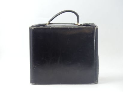 HERMES. Large toiletry bag in black box calf,...