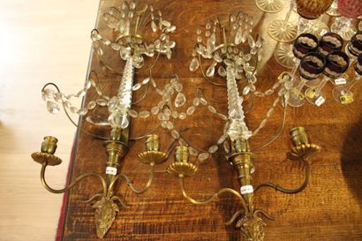 Two sconces in bronze and glass for two boiled...