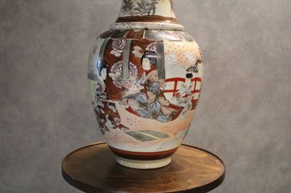 Satsuma 
Vase with long neck in polychrome...