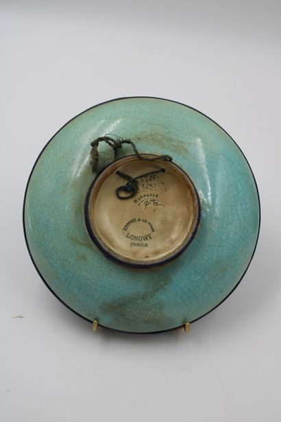 Meeting of two plates one in porcelain with...