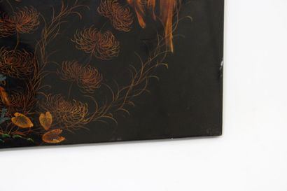 CHINA. Black lacquered wood panel decorated...