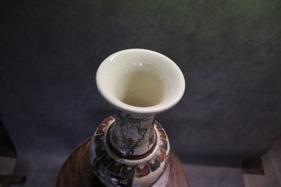Satsuma 
Vase with long neck in polychrome...