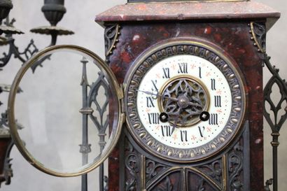 Clock in the shape of a gothic church and...