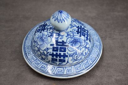 CHINA. Porcelain covered vase with blue flowers....