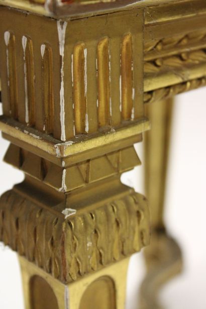 Pair of stools in carved and gilded wood...