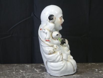 CHINE. 
Buddha with children in white porcelain....