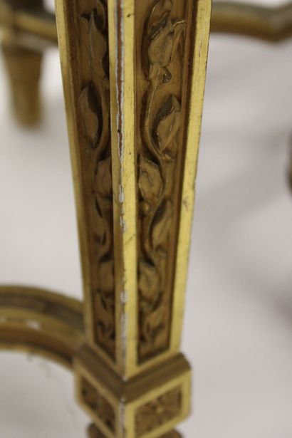 Pair of stools in carved and gilded wood...