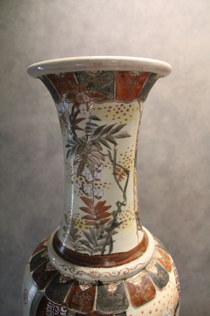 Satsuma 
Vase with long neck in polychrome...