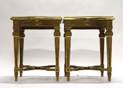 Pair of stools in carved and gilded wood...