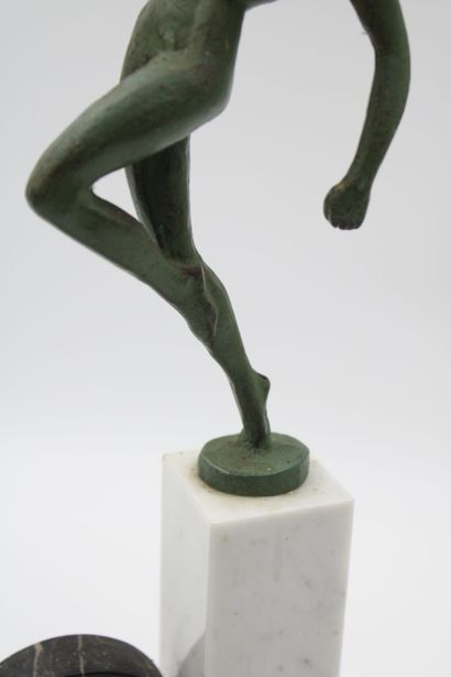 ART DECO 
Woman with a ball, green patinated...